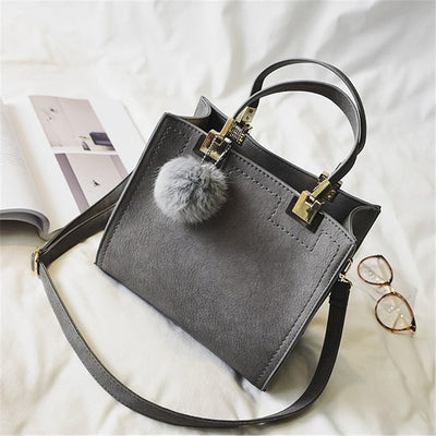 SUPERPLUSH - Suede Leather Handbag w/ Fur Ball